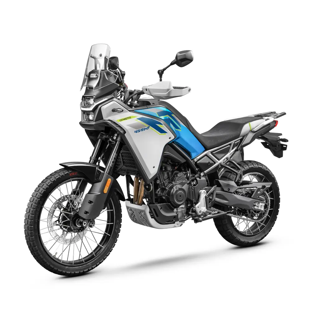 Side view of a modern CFMOTO motorcycle with off-road tires, blue and silver bodywork, tall windshield, and black seat against a white background.